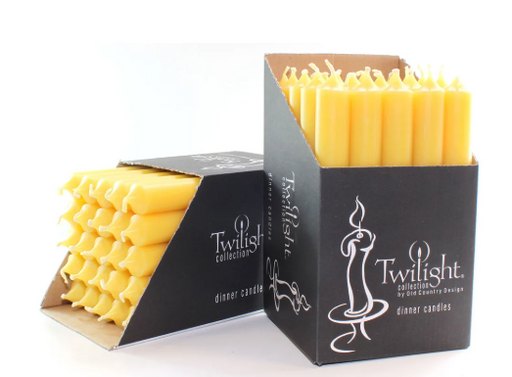 Two boxes of Twilight collection dinner candles on a white background