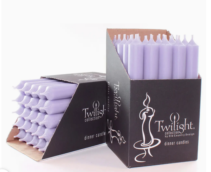 Box of Twilight Collection dinner candles on a white background