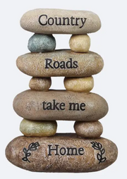 Stack of stones with engraved text on a white background
