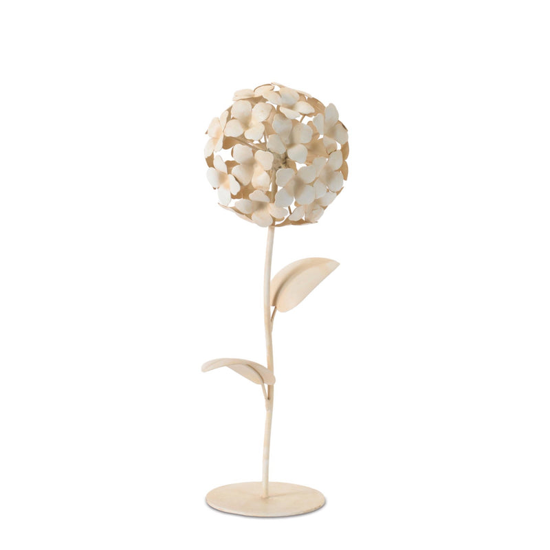 Decorative lamp shaped like a flower with a white and gold design on a white background