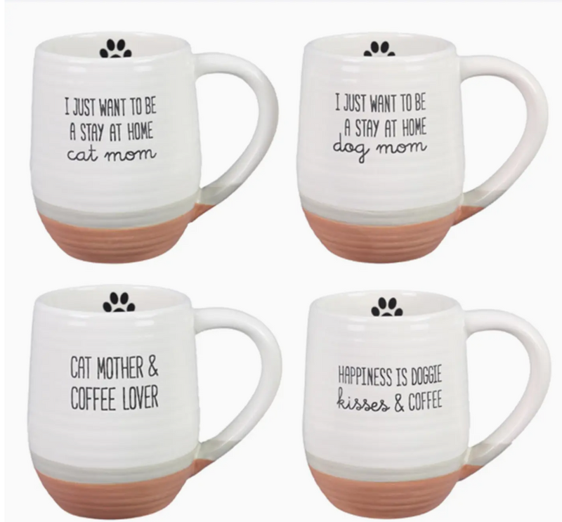 Four white mugs with text and paw prints on a white background