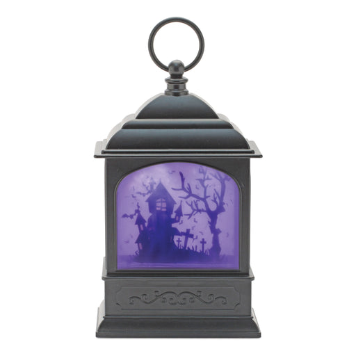Black lantern with purple Halloween design on a white background