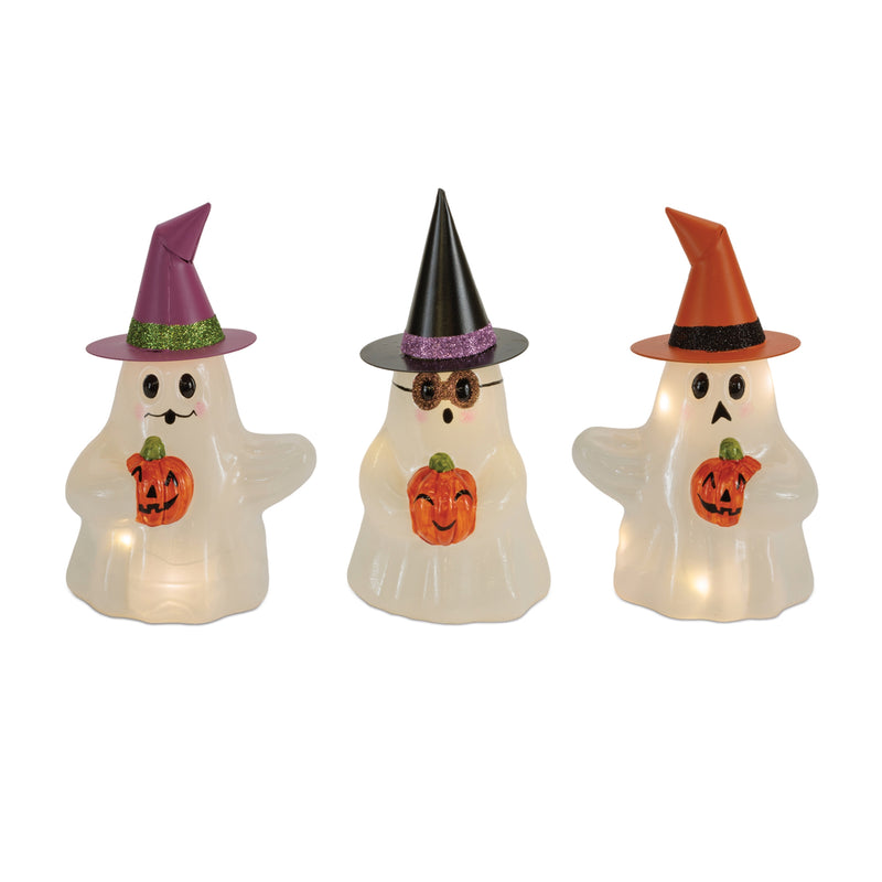 Three Halloween-themed ghost lights with colorful hats on a white background