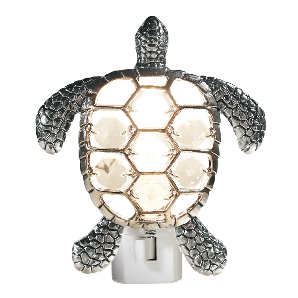 Tortoise-shaped night light with a white background