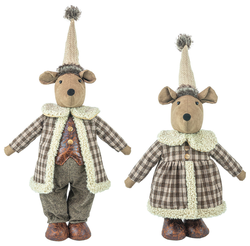 Two rustic Christmas tree decorations shaped like deer, dressed in brown plaid winter clothes with cream faux-fur trim and tall knit hats with pom-poms, shown on a white background.