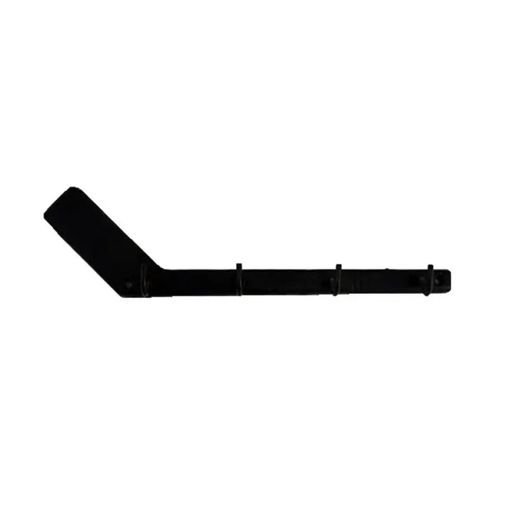 A cast iron key hanger in the shape of a hockey stick