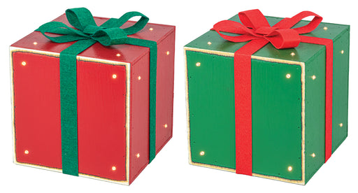 Two small decorative gift boxes on a white background, one red with a green ribbon and bow, and one green with a red ribbon and bow.
