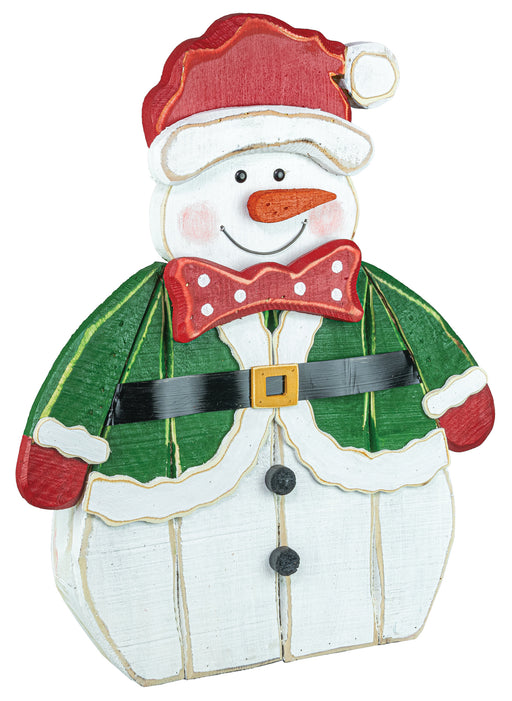 A painted wooden snowman Christmas decoration wearing a red Santa hat, green coat, red bow tie, black belt, and white pants, shown on a plain white background.