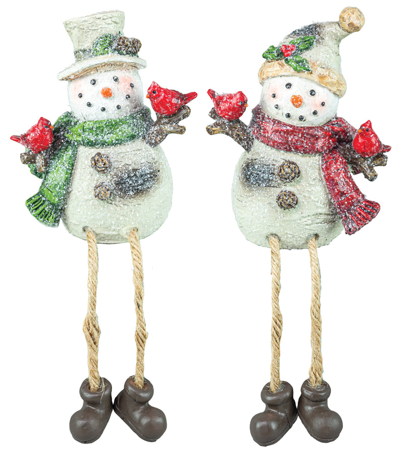 Two snowman holiday decorations with rope legs and dark brown boots, each wearing a hat, scarf, and holding red bird ornaments, shown on a white background.