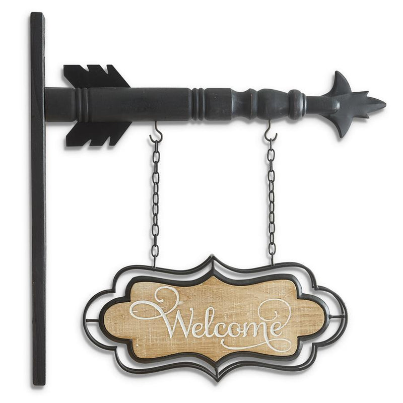 Decorative metal sign with 'Welcome' on a white background
