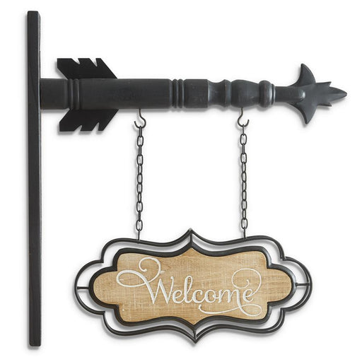 Decorative metal sign with 'Welcome' on a white background