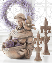 Statue of a man holding a bowl of flowers with decorative elements in the background