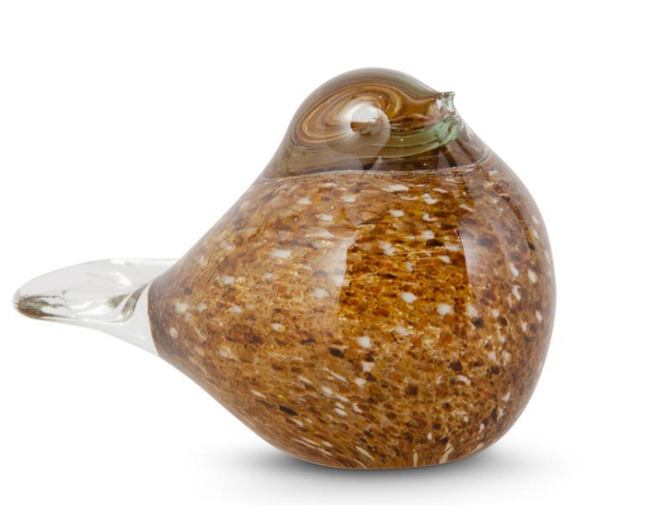 Glass bird figurine with brown and clear pattern on a white background