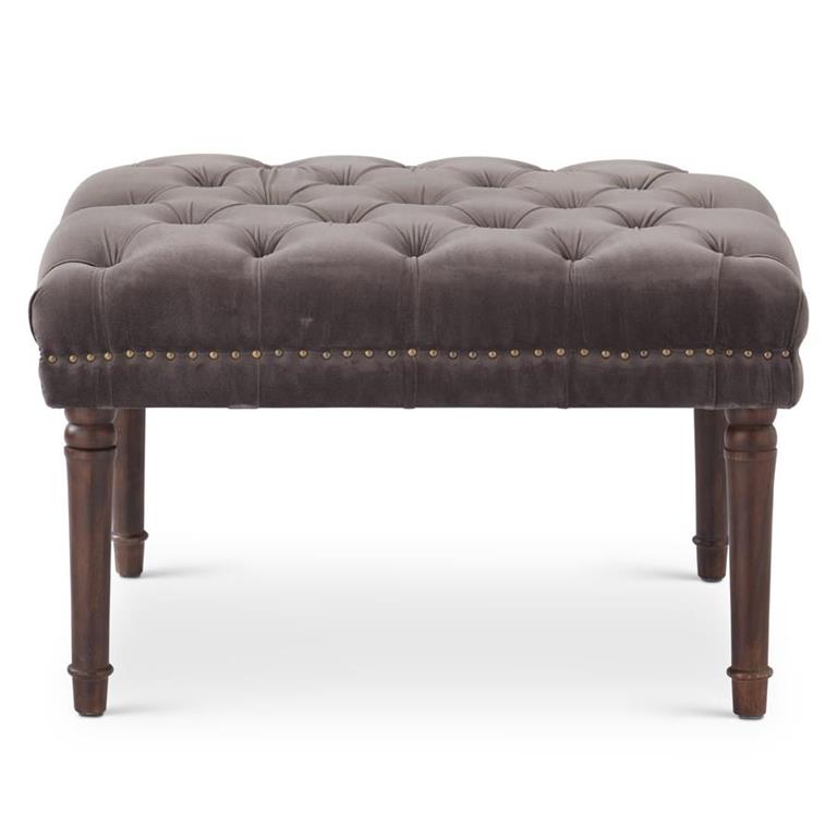 Gray tufted ottoman with wooden legs on a white background