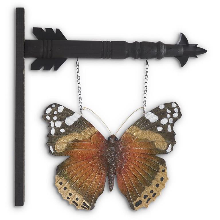 Butterfly-shaped decorative wall art with a black arrow-like structure on a white background