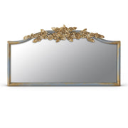 Decorative mirror with floral design on a white background