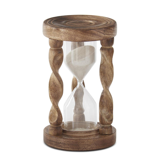 Wooden hourglass with sand on a white background