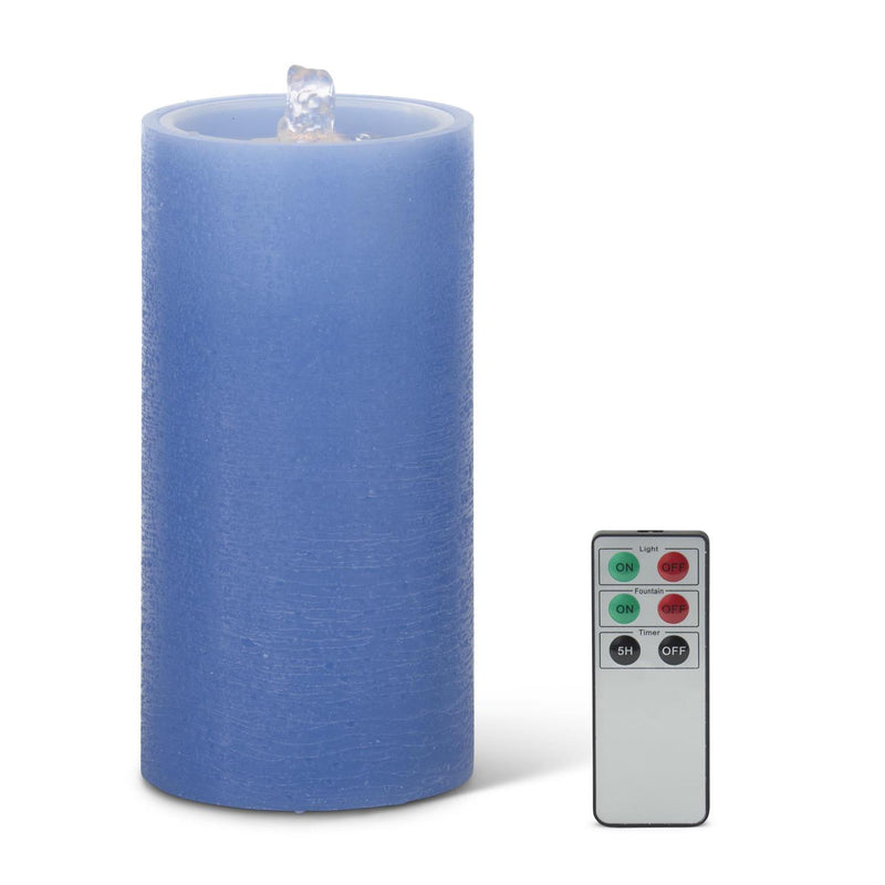 Blue LED candle with a remote control on a white background
