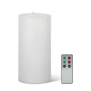 White candle with a remote control on a white background