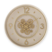 Decorative wall clock with gold gears and numbers on a beige background