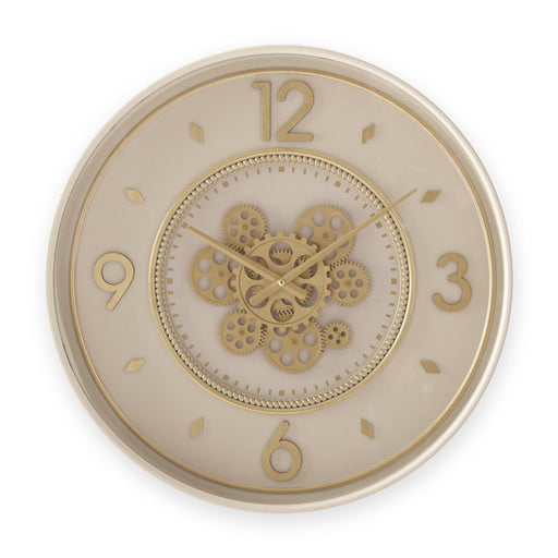 Decorative wall clock with gold gears and numbers on a beige background