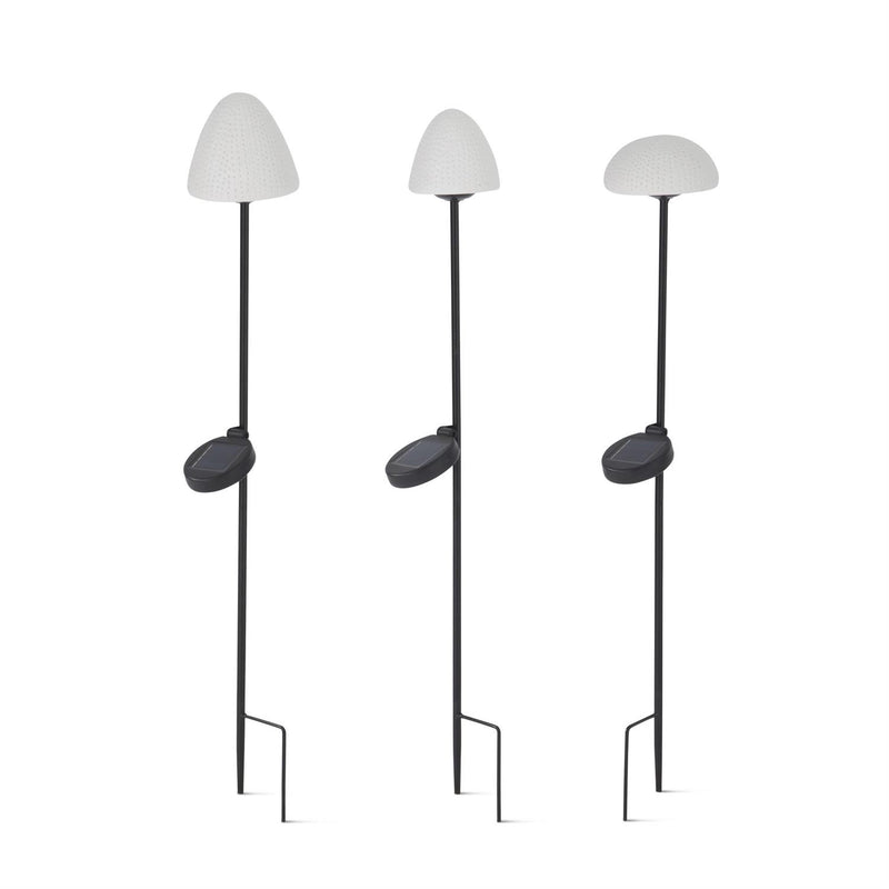 Three modern floor lamps with white shades and black bases on a white background
