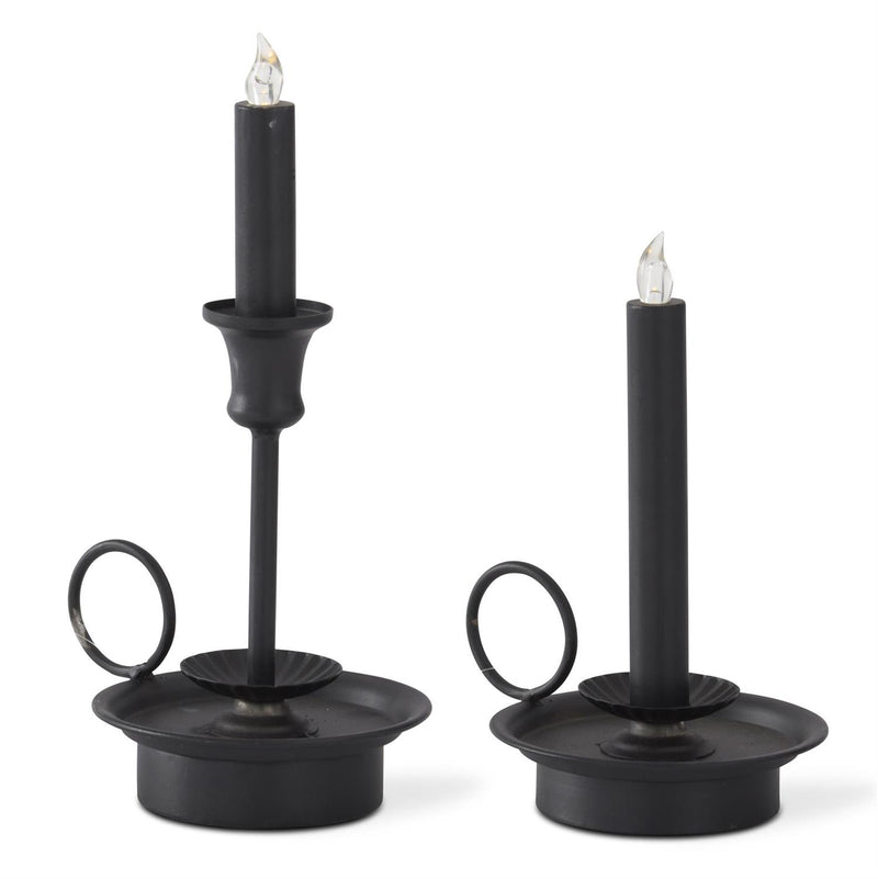 Two black colored LED candles with a metal decoration and a timer, displayed against a white background.