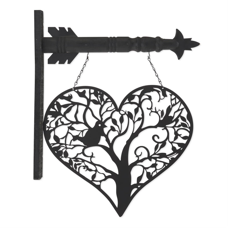 Decorative metal wall art with heart design and arrow on a white background