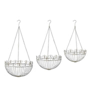 Three decorative metal hanging baskets with chains on a white background