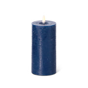Blue candle on a white background