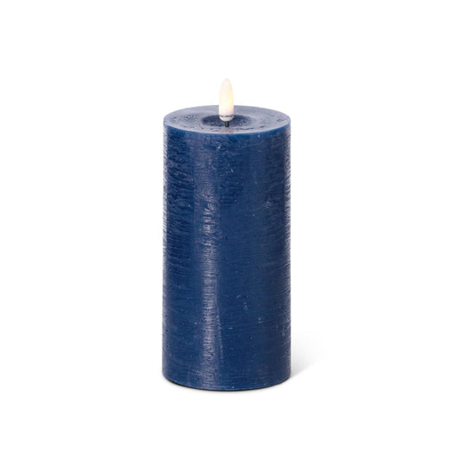 Blue candle on a white background