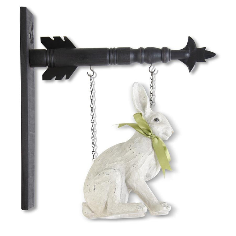 Decorative rabbit figurine hanging from a metal hook with a chain.