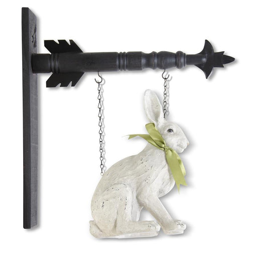 Decorative rabbit figurine hanging from a metal hook with a chain.