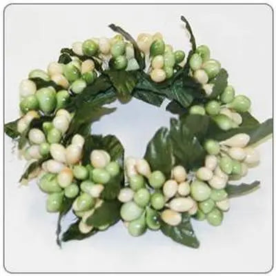 Artificial green leaf wreath with berries on a white background