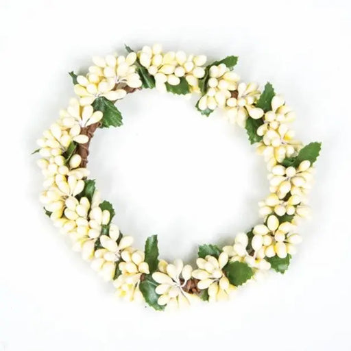 Decorative wreath with white flowers and green leaves on a white background
