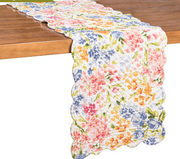 Floral patterned table runner on a wooden table