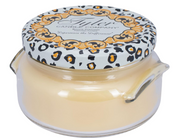 Candle jar with decorative leopard print lid on a white background