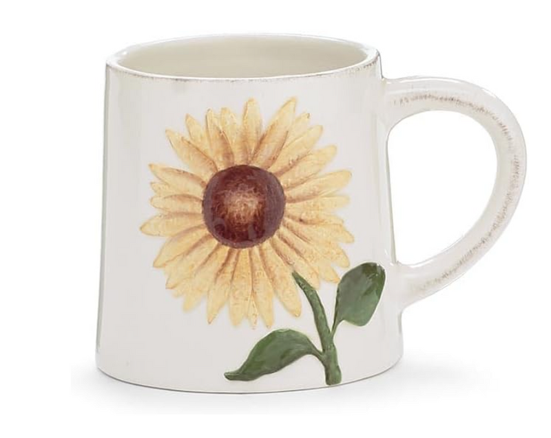 White mug with a sunflower design on a white background