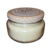 Tyler Candle Company jar candle with leopard print lid on a white background