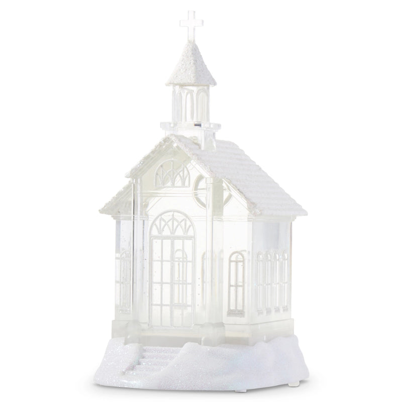 White decorative birdcage with a snowy base on a white background