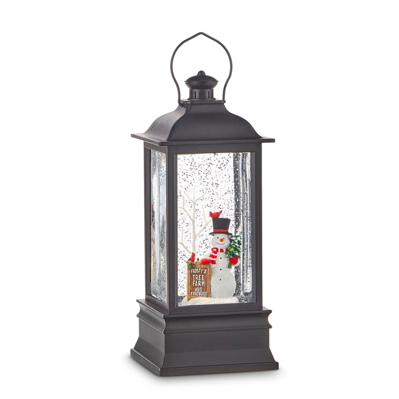 Black lantern with a snowman inside on a white background