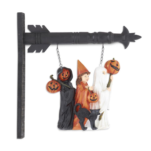 Decorative Halloween sign with three figures holding pumpkins and a black cat on a white background.