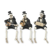 Three skeleton figures in top hats playing musical instruments on a white background