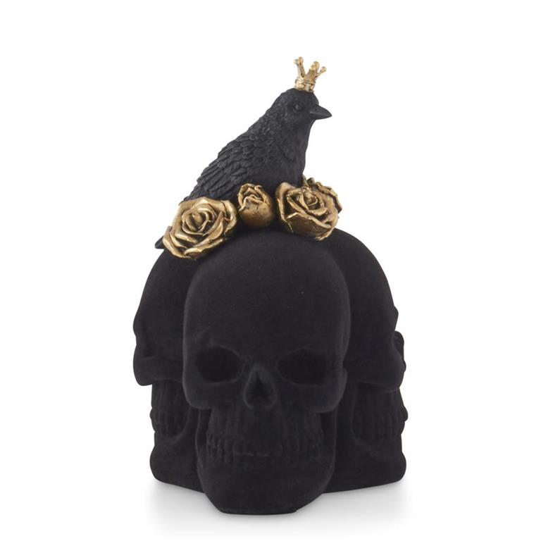 Decorative skull with a crow wearing a gold crown and roses on a white background