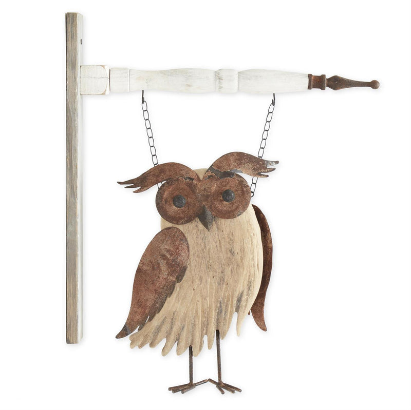Decorative owl hanging on a white background