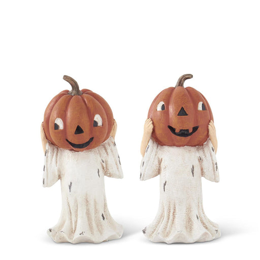 Two pumpkin ghost figurines on a white background