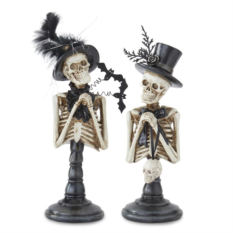 Two skeleton figures with top hats on a white background