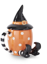 Halloween-themed mug with a witch hat, striped handle, and black legs on an orange background