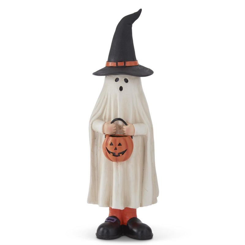 A figurine of a ghost wearing a witch's hat, holding a pumpkin, primarily in white and black colors with orange accents.
