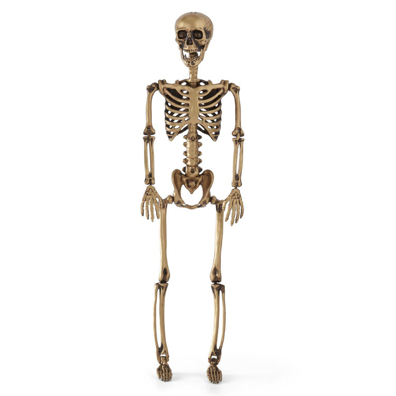 A gold-colored posable skeleton figure standing upright against a white background.